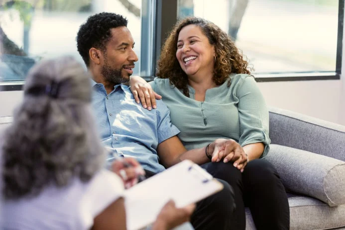 A couple talking with a therapist