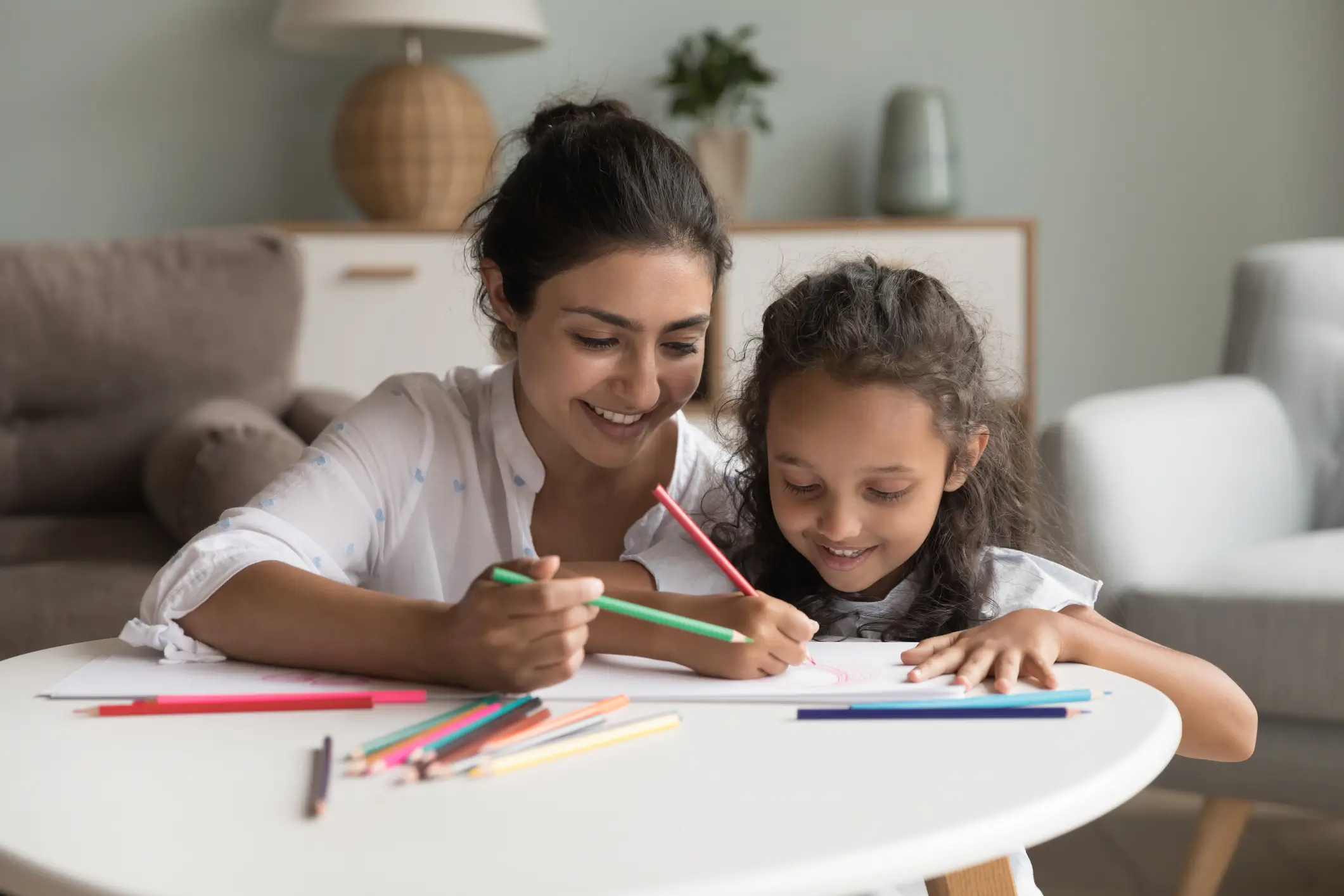Parent drawing with child
